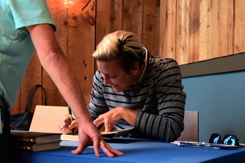 Wambach book signing delights fans, points to success for College Town