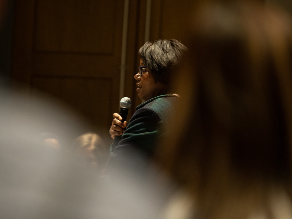 At event on &#8216;Hands up&#8217; photo, calls for action and healing