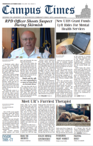 Front page of the October 4th print edition. Photo of RPD chief and a laptop showing UHS's website. Photo of golden retriever at bottom for article about Sasha the therapy dog.