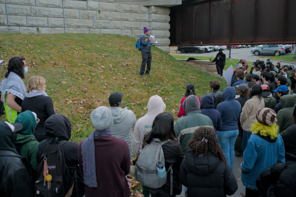 Protestors gather to oppose suspension and arrest of four students for &#8220;wanted&#8221; posters